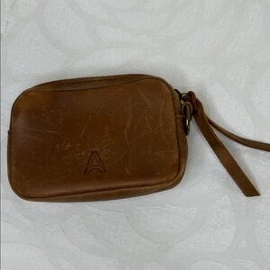ABLE brown leather small wristlet. Handmade. Made in Ethiopia.